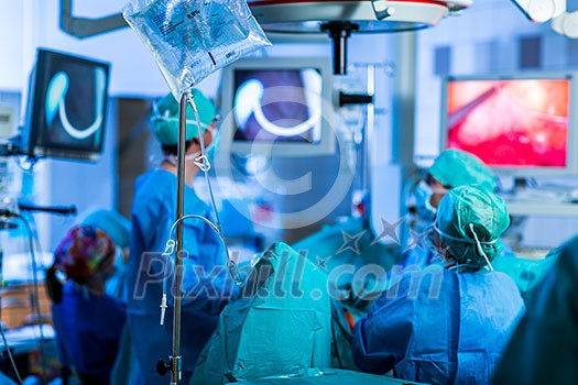Unidentified patient undergoing a surgery (no faces, shallow DOF)
