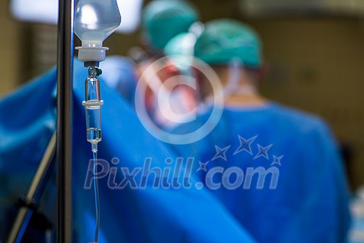 Unidentified patient undergoing a surgery (no faces, shallow DOF)