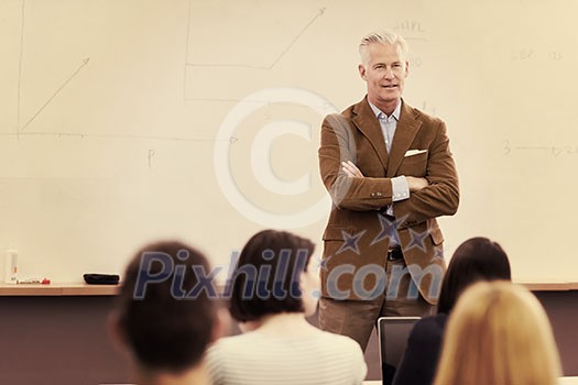 group of students study with professor in modern school classroom group of students study with professor in modern school classroom
