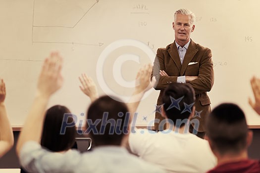 group of students study with professor in modern school classroom group of students study with professor in modern school classroom