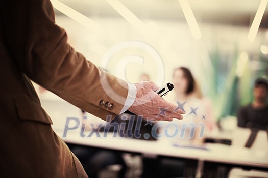 close up of teacher hand with marker while teaching lessons in school classroom to students close up of teacher hand with marker while teaching lessons in school classroom to students
