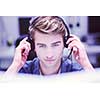 young smiling male call centre operator doing his job with a headset