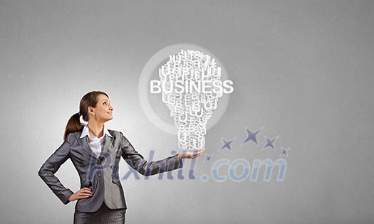 Businesswoman holding in hands successful idea concept Businesswoman holding in hands successful idea concept