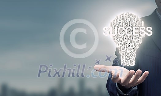 Businessman holding in hands successful idea concept Businessman holding in hands successful idea concept
