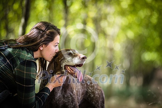 Autumn hunting season. Hunting. Outdoor sports. Woman hunter in the woods Autumn hunting season. Hunting. Outdoor sports. Woman hunter in the woods