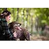 Autumn hunting season. Hunting. Outdoor sports. Woman hunter in the woods