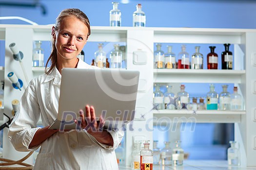 Portrait of a female researcher doing research in a lab (shallow DOF; color toned image) Portrait of a female researcher doing research in a lab (shallow DOF; color toned image)