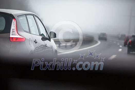 Cars going fast on a highway Cars going fast on a highway
