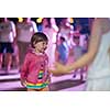 little cute girl carefully spending time while dancing in the kids disco