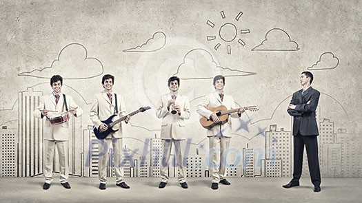 Man orchestra in suit playing different music instruments Man orchestra in suit playing different music instruments