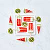 Slices of watermelon and kiwi in the form of a circle and a triangle around a plate with a healthy ice cream lolly in the shape of a square on a gray marble background with space for texas. Food pattern. Flat lay