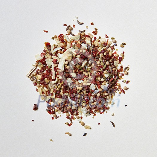 A mix of flavoring spices for the cooking of natural organic homemade food. Food and cuisine ingredients on a white with copy space. Flat lay A mix of flavoring spices for the cooking of natural organic homemade food. Food and cuisine ingredients on a white with copy space. Flat lay