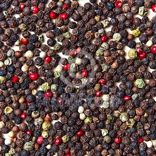 Organic natural background of pepper - red, black, green, white. Food or spicy cooking concept. Healthy eating background. Flat lay Organic natural background of pepper - red, black, green, white. Food or spicy cooking concept. Healthy eating background. Flat lay