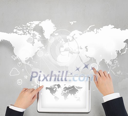 Businessman hands working on tablet with world map on screen
