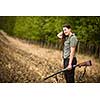 Autumn hunting season. Hunting. Outdoor sports. Woman hunter in the woods