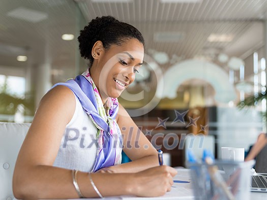 Young woman in an office Young woman in an office