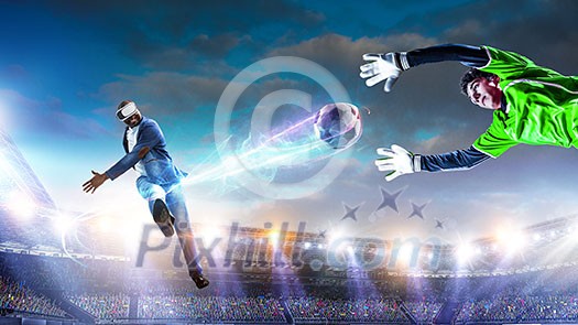 Aframerican man wearing virtual helmet and trying soccer game. Mixed media Aframerican man wearing virtual helmet and trying soccer game. Mixed media