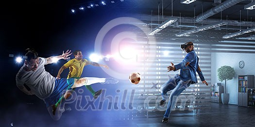 Aframerican man wearing virtual helmet and trying soccer game. Mixed media