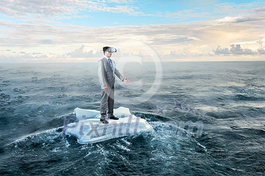 Young businessman wearing virtual helmet. Mixed media Young businessman wearing virtual helmet. Mixed media