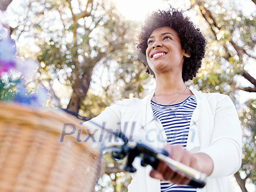 Happy young woman with bicycle in the park Happy young woman with bicycle in the park