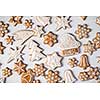 Big set Christmas gingerbread: gingerbread houses, crescent, gingerbread man, snowflakes, sock, Christmas tree, bell, star, new year's ball on white background