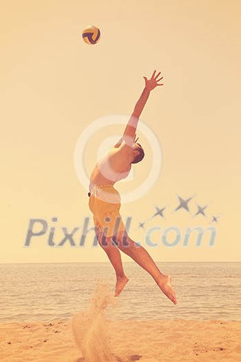 male beach volleyball game player jump on hot sand