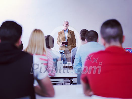 group of students study with senior professor in modern school classroom on creative class group of students study with senior professor in modern school classroom on creative class