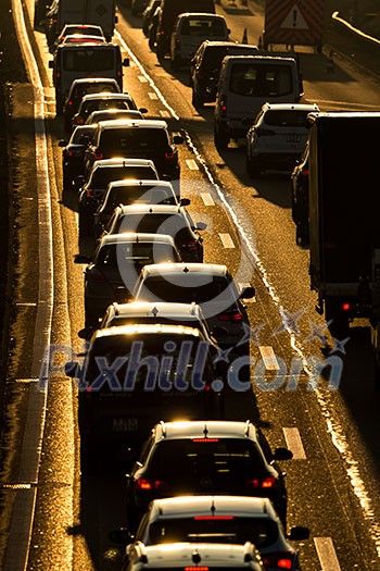 Heavy morning city traffic/congestion concept - cars going very slowly in a traffic jam during the morning rushhour Heavy morning city traffic/congestion concept - cars going very slowly in a traffic jam during the morning rushhour