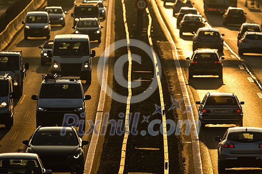 Heavy morning city traffic/congestion concept - cars going very slowly in a traffic jam during the morning rushhour Heavy morning city traffic/congestion concept - cars going very slowly in a traffic jam during the morning rushhour
