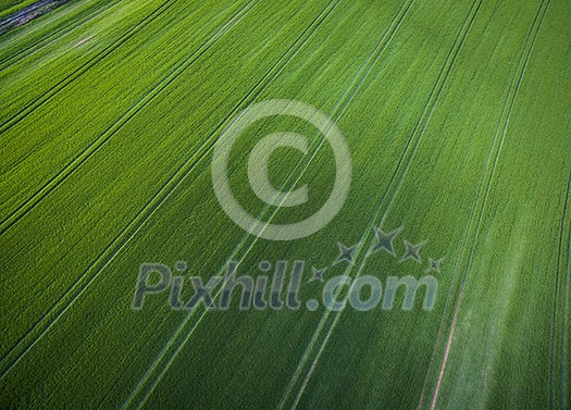 Farmland from above - aerial image of a lush green filed Farmland from above - aerial image of a lush green filed