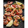 Large grilled BBQ shrimp with sweet chili sauce, green onion and lemon