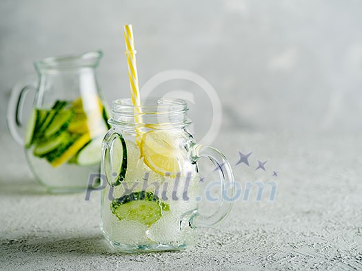 Fresh Summer Drink. Healthy detox fizzy water with lemon and cucumber in mason jar. Healthy food concept. Detox diet.