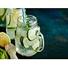 Fresh Summer Drink. Healthy detox fizzy water with lemon and cucumber in mason jar. Healthy food concept. Detox diet.