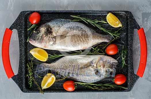 Fresh Raw Dorado with lemon, thyme, cherry and rosemary 