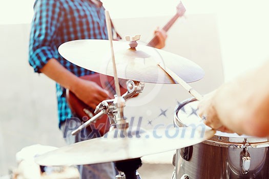 A street muscian playing drums A street muscian playing drums