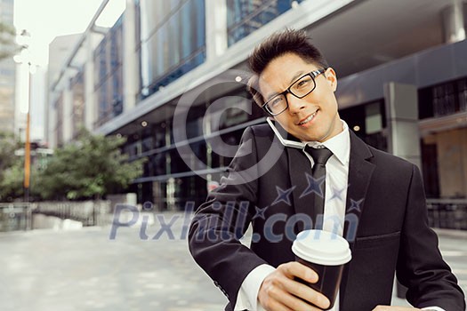 Businessman outdoors in city business district