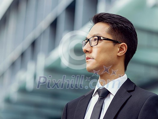 Businessman outdoors in city business district