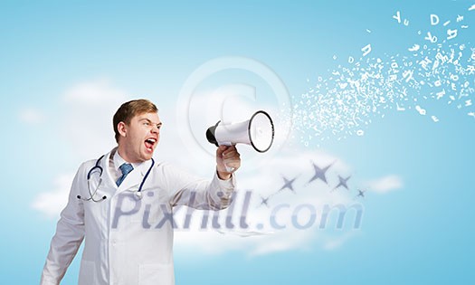 Young male doctor screaming in megaphone emotionally