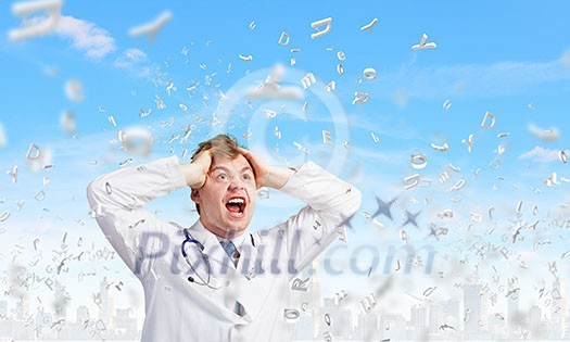 Young frustrated crazy doctor screaming very emotionally Young frustrated crazy doctor screaming very emotionally