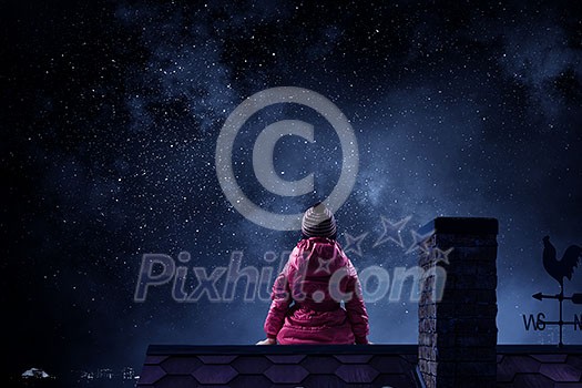 Cute kid girl sitting on house roof. Mixed media