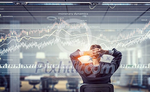 Relaxed businessman at the office sitting back with his hands behind his head Relaxed businessman at the office sitting back with his hands behind his head