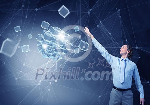 Businessman reaching hand to touch 3D rendering cube figure Businessman reaching hand to touch 3D rendering cube figure