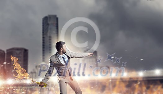 Aggressive businessman in suit throwing burning molotov cocktail Aggressive businessman in suit throwing burning molotov cocktail
