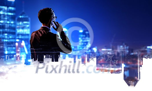 Double exposure of elegant businessman and modern city on white background