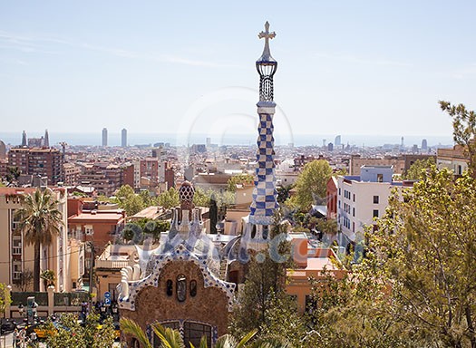 Barcelona, Spain - April 15, 2013: Gatehouse at the main entrance to Park Guell, which were originally designed as the caretaker's house is the famous architectural town Barcelona, Spain - April 15, 2013: Gatehouse at the main entrance to Park Guell, which were originally designed as the caretaker's house is the famous architectural town