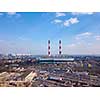 Panoramic view of Electric utility Company in an industrial zone on a background of clear blue sky. Aerial view from drone, city Kiev Ukraine.