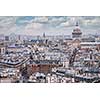 top view of one of the towers of Notre Dame . In the background is seen Pantheon of Paris.