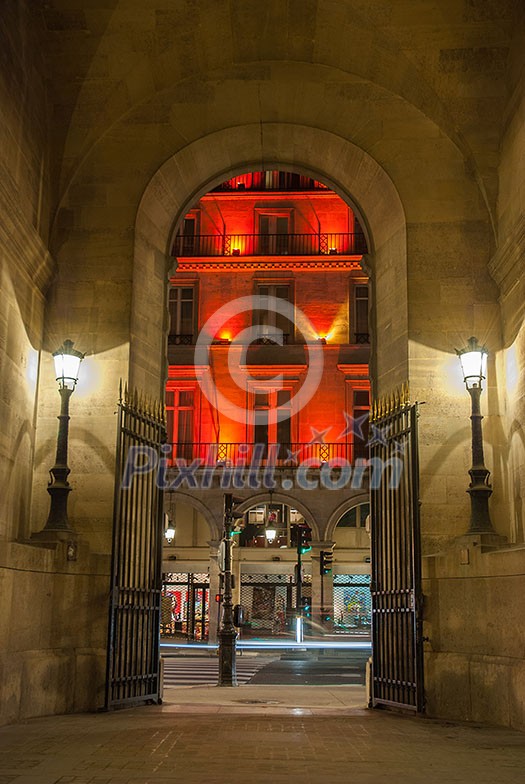 Paris, France - August 04, 2006: Arch entrance to the gallery of Vivien in the evening. An ancient historical passage and a tourist attraction in in France