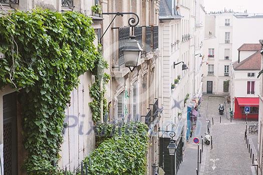 Paris, France - May 22, 2012: Houses on Montmartre street in Paris,in the spring day view from a height. Paris, France - May 22, 2012: Houses on Montmartre street in Paris,in the spring day view from a height.