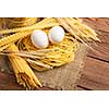 Close of spaghetti and eggs on table